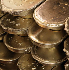 Close up photo of stacked babbitt ingots.