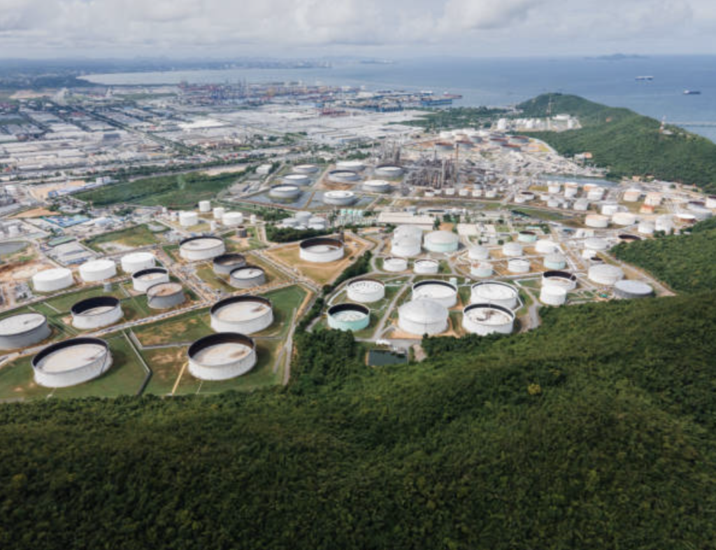 Petrochemical processing facility with pumps and rotating equipment using industrial bearings.